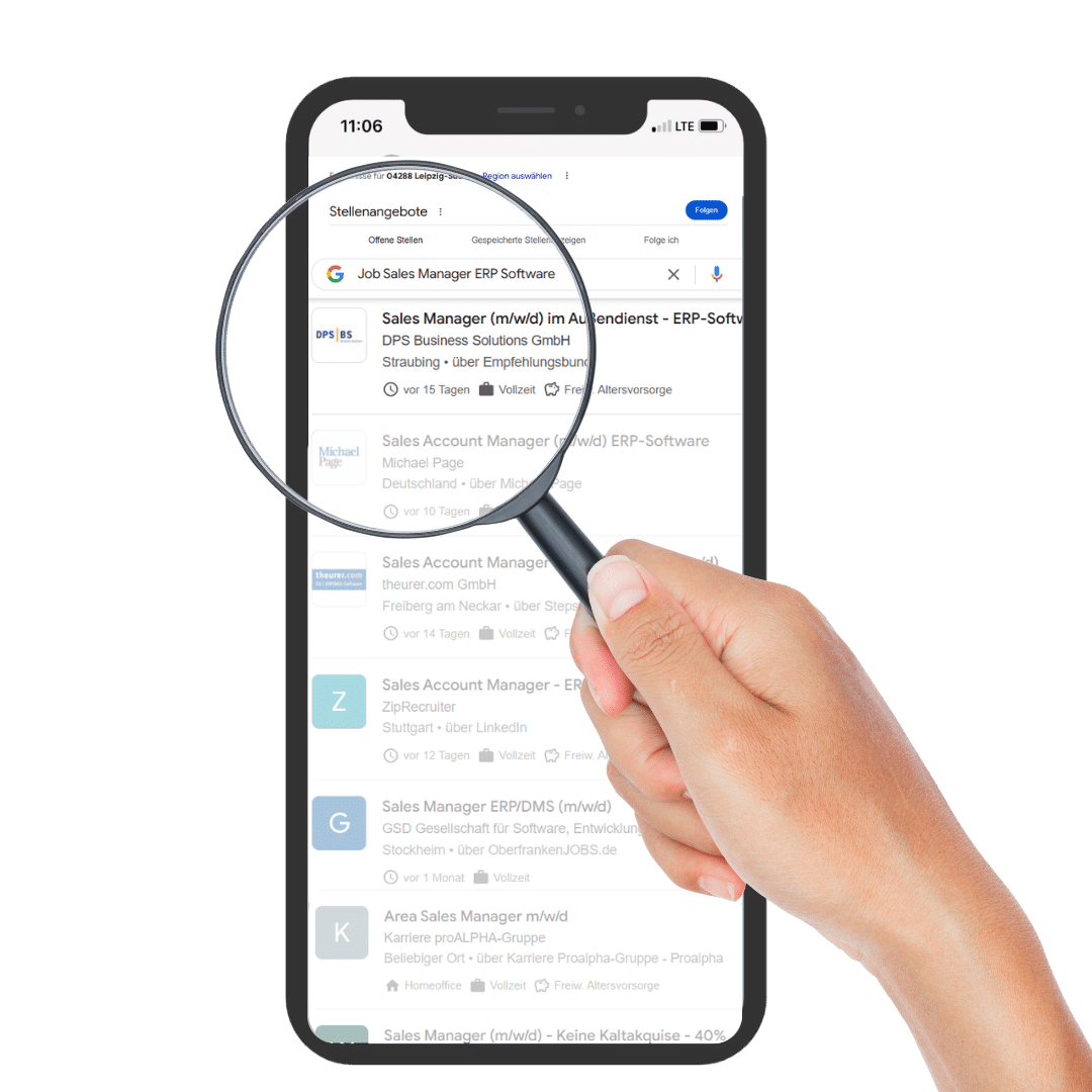 Smartphone mit einer Google for Jobs Jobsuche, auf die eine Lupe gerichtet ist